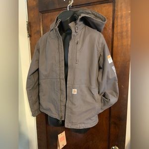 Women’s gray unworn, Carhart winter coat Sherpa lined. great condition